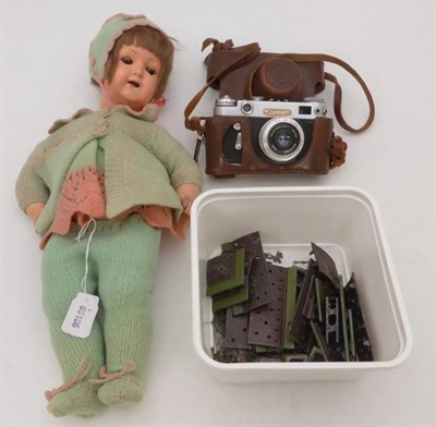 Lot 182 - Russian camera, German doll and Britains lead garden (damages)