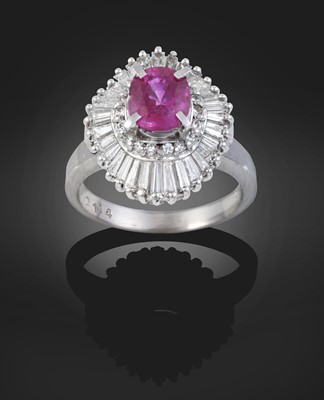 Lot 2085 - A Ruby and Diamond Cluster Ring