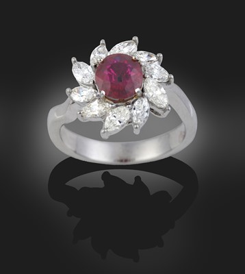 Lot 2092 - A Ruby and Diamond Cluster Ring