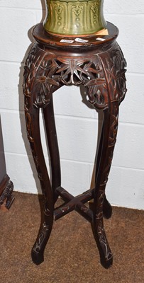 Lot 1394 - A 19th century Chinese hardwood plant stand,...