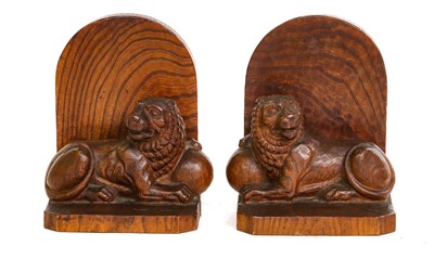 Lot 112 - A pair of carved hardwood bookends each...