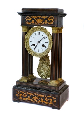 Lot 8 - A French portico inlaid striking mantel clock