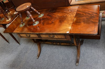 Lot 1088 - A George III style sofa table