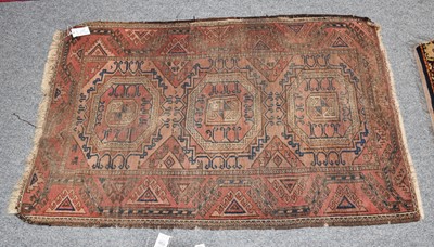 Lot 1119 - Afghan Baluch rug, the field with three Salor...