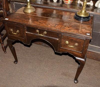 Lot 1304 - A George III oak lowboy, 94cm by 51cm by 70cm