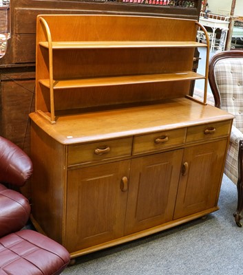 Lot 1281 - A Priory elm sideboard with two-tier plate...