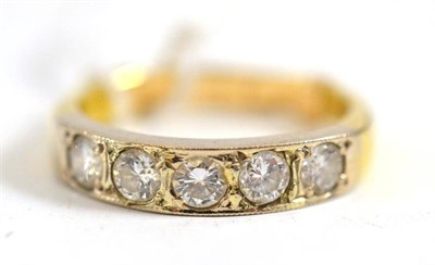 Lot 196 - A diamond five stone ring the round brilliant cut diamonds in a white claw setting with a...