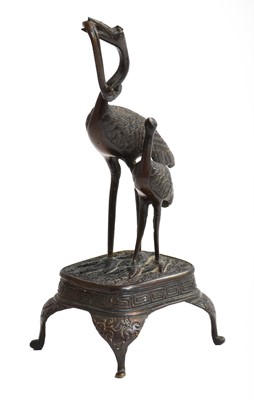 Lot 237 - A Chinese patinated bronze sculpture of a...