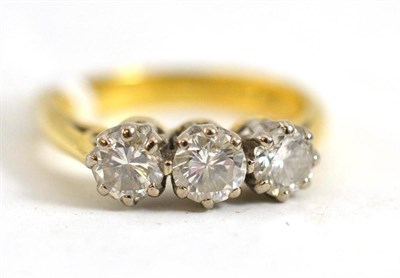 Lot 197 - An 18ct gold diamond three stone ring, 1.00 carat approximately