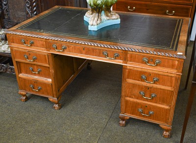 Lot 1448 - A 20th century walnut gilt tooled black...