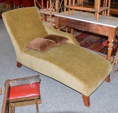 Lot 1214 - A reproduction chaise longue in Colefax &...