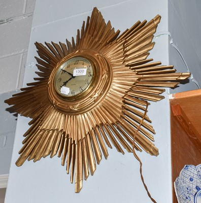 Lot 1300 - A synchronome electric sunburst wall timepiece