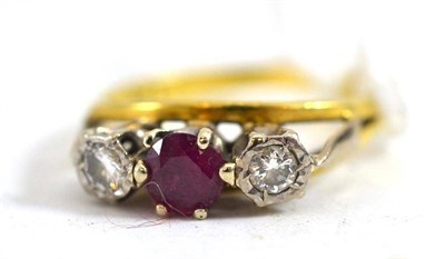 Lot 199 - A ruby and diamond three stone ring