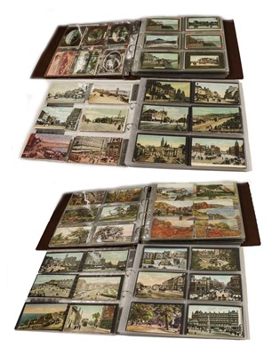 Lot 214 - Two albums containing over 500 postcards...