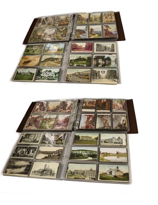 Lot 214 - Two albums containing over 500 postcards...
