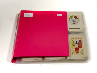 Lot 216 - A pink album containing 84 silk items, 81 of...