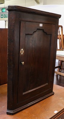 Lot 1242 - An 18th century oak corner cupboard, 69cm by...