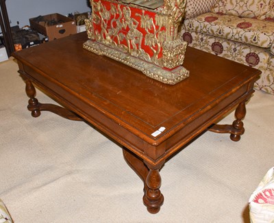 Lot 1222 - A Titchmarsh & Goodwin style oak coffee table,...