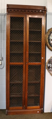 Lot 1320 - ~ A large two door walnut cupboard, the doors...