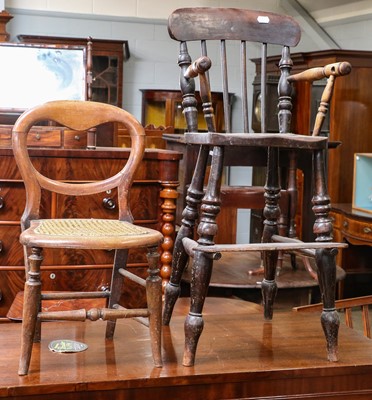 Lot 1358 - ~ A 19th century elm child's high chair...