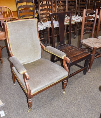 Lot 1210 - A George III provincial oak plank seated chair,...