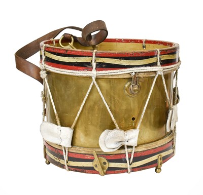 Lot 324 - ~A brass bound and painted marching drum with...