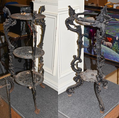 Lot 1219 - ~ A Victorian cast iron three-tier plant stand,...