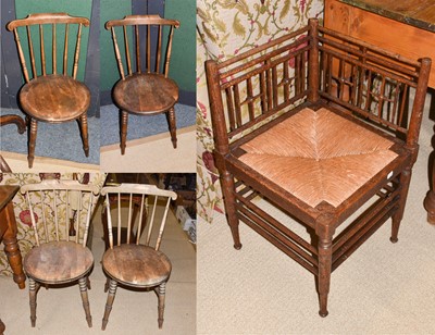 Lot 1226 - An early 20th century oak Arts & Crafts corner...