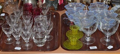 Lot 232 - Two trays of assorted glassware including eight Vaseline glass bowls