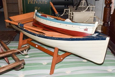 Lot 1264 - A large blue and white painted model rowing...