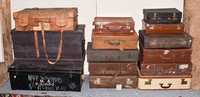 Lot 1267 - Twelve various leather and fabric suitcases of...