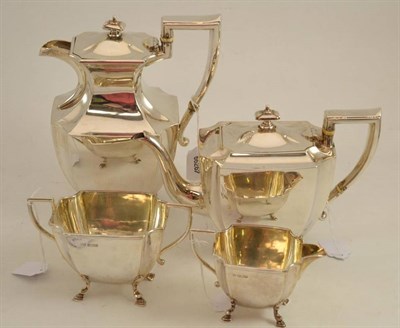 Lot 233 - A silver four piece tea set by J S, Sheffield 1919/1923/1920