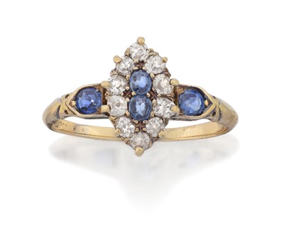 Lot 2052 - A Sapphire and Diamond Cluster Ring