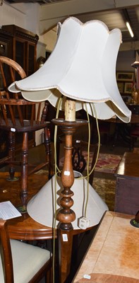 Lot 1322 - An early 20th century walnut standard lamp...