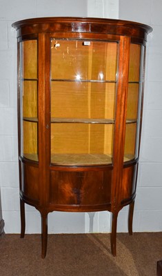 Lot 1327 - An Edwardian inlaid mahogany bow front display...