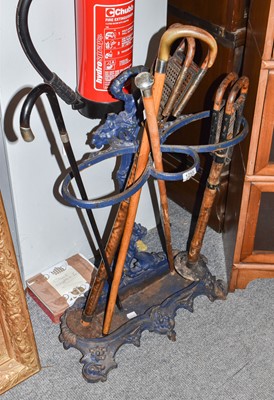 Lot 1255 - A cast iron stick stand, two bamboo shooting...
