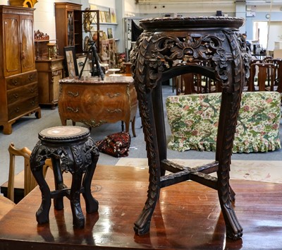 Lot 1183 - Two Chinese carved hardwood jardiniere stands...