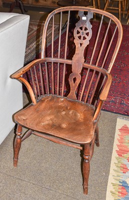 Lot 1374 - A 19th century elm Windsor chair