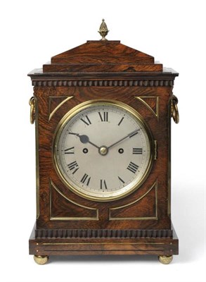 Lot 1052 - A Rosewood Striking Table Clock, 19th century, chamfered top with pineapple finial, side...