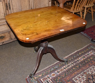 Lot 1403 - A 19th century mahogany tilt-top tripod table,...