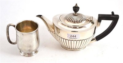 Lot 244 - Silver tea pot by Goldsmiths & Silversmiths, Sheffield and a silver tankard