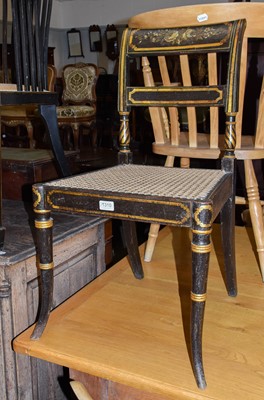 Lot 1310 - A pair of Regency ebonised side chairs with...