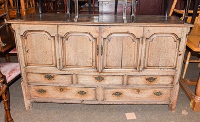 Lot 1312 - A George III light oak mule chest (the top...