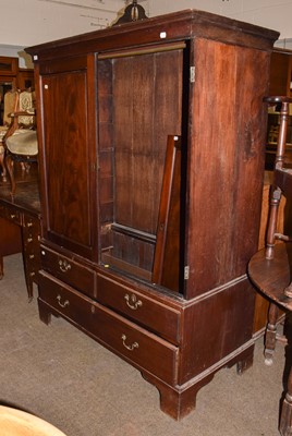 Lot 1415 - A George III mahogany cupboard, with two...