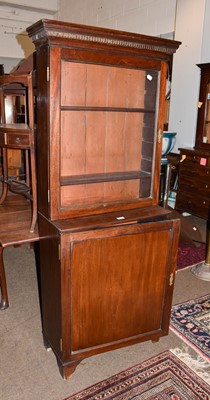 Lot 1425 - An 18th century mahogany gateleg dining table,...