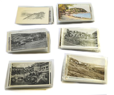 Lot 229 - A large black postcard case containing approx....