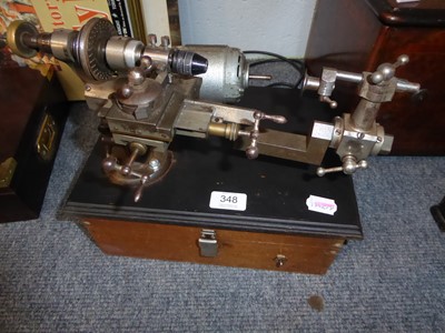 Lot 348 - A watchmaker's lathe with collets, etc