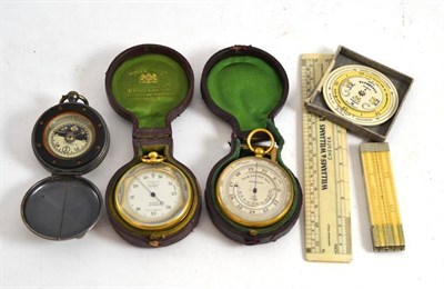 Lot 261 - Two Ross pocket barometers in leather cases, Stewart Patent liquid compass, early 20th century...