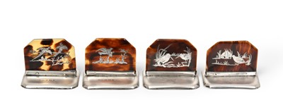 Lot 2106 - A Set of Four George V Silver and Tortoiseshell Place-Card Holders