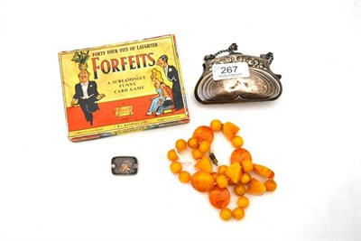 Lot 267 - Silver hinged purse, Victorian silver brooch, boxed J & L Randall Ltd game of Forfeits and an amber